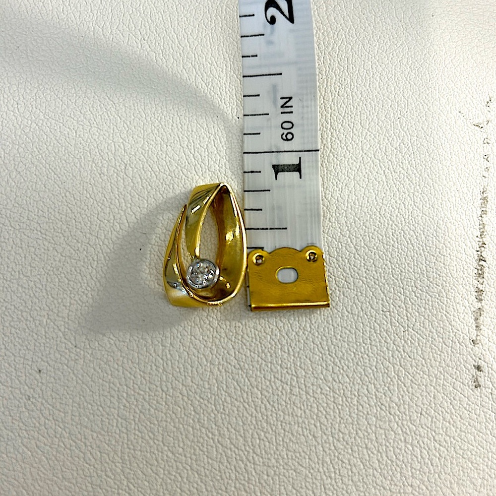 Diamond and 14k gold pendant